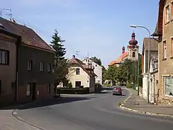 Průhled obcí ke kostelu sv. Anny