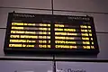 Odjezdová tabule na autobusovém nádraží