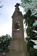 Detail horní části zvonice