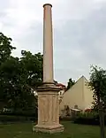 Nový sloup určený pro obnovení památníku byl do května 2020 v zahradě kostela svatého Karla Boromejského pod Petřínem