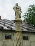 Sloup_se_sochou_P._Marie_(Velký_Týnec),_detail.JPG