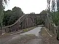 Tyršův most, asi 250 m pod jezem