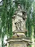 Socha_sv._Floriána_(Velký_Týnec),_detail.JPG