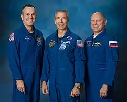 Zleva Arnold, Feustel, Artěmjev