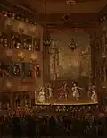 Hra za přítomnosti krále Stanislawa II. Augusta v srpnu 1790. Obraz zachycuje interiér prvního varšavského Národního divadla na náměstí Krasińských. Toto divadlo štědře podpořila Elżbieta Lubomirska.