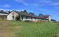 Rozpadající se zemědělské budovy