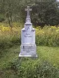 Kříž na bývalém hřbitově u kostela