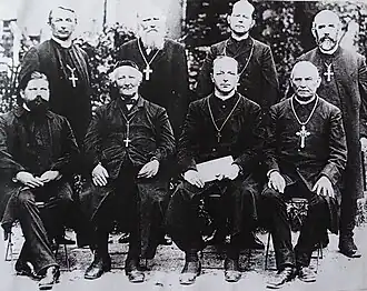 Starokatolický kongres v Rotterdamu v roce 1894. Sedící zleva: Miloš Čech (správce rakouského biskupství), Rinkl (biskup z Haarlemu), Gul (utrechtský arcibiskup), Reinkens (1. německý starokatolický biskup). Stojící zleva: Herzog (biskup Švýcarska), Janitschev (arcikněz z Ruska), Spit (biskup z Deventeru), Hale (biskup z Cairo z Episkopální církve Severní Ameriky).