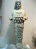 Socha nalezená v roce 1912 v dnešní Libyii ve starověkém městě Leptis Magna nedaleko amfiteátru, dnes Národní muzeum v Tripolisu