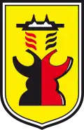 Kuçovë – znak