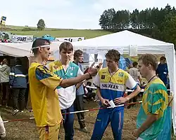 Diskutující nejlepší muži po 3. úseku