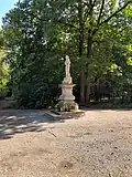 Socha sv. Juliány na rozcestí lesních cest u Přední Kopaniny