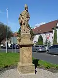 Socha svatého Prokopa přesunutá do Mostu