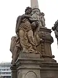 Socha svaté Rozálie držící lebku