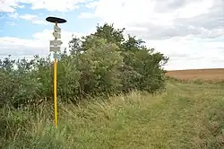Turistický rozcestník na vrcholu