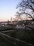 Pohled na centrum města z vyhlídky u zámku, na fotografii jsou patrné obchodní domy vybudované v 80. letech 20. století.
