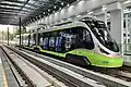 Tramvaj 27T ve stanici na trati Nanhai New Transit