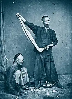Pouliční hráči, asi 1868 - 1871