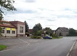 Náves v Tlustici