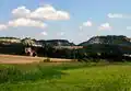 Krajina kolem Tmaně s kostelem svatého Jiří