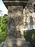 Sv. Florián na reliéfu dříku sloupu sv. Jana Nepomuckého