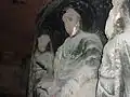 Sochy buddhů poničené během Kulturní revoluce