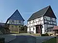 Podstávkové domy s hrázděným patrem
