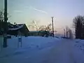Autobusová zastávka U Míčky s bývalým hostincem