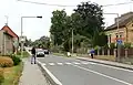 Silnice I. třídy č. 11 ve středu obce