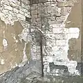 zazděný vchod do románské rotundy (11./12. stol.)