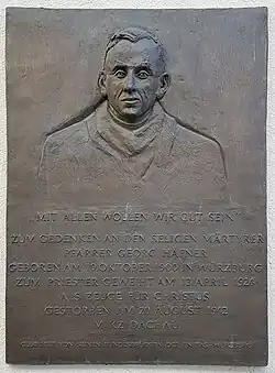 Jeho pamětní deska na budově kněžského semináře ve Würzburgu