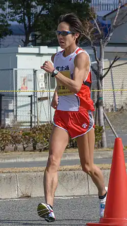 Muži - Júsuke Suzuki 1:16,36 hod. Ano