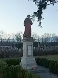 Socha sv. Františka u hřbitova