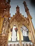 Detail dřevěného oltáře v zámecké kapli